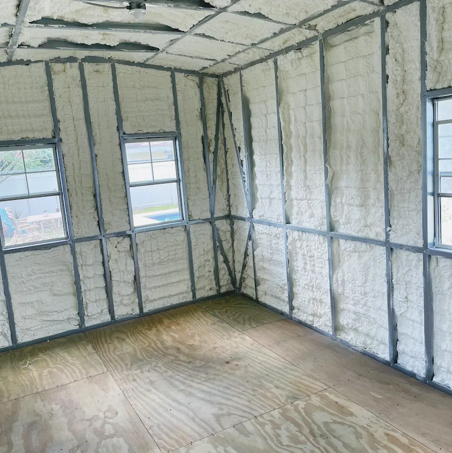 Closed-cell spray foam insulation applied to wall cavities in a residential project in Orion